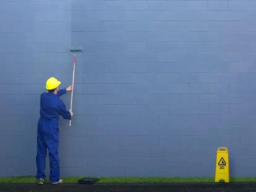 Painting professional preparing or coating commercial surfaces
