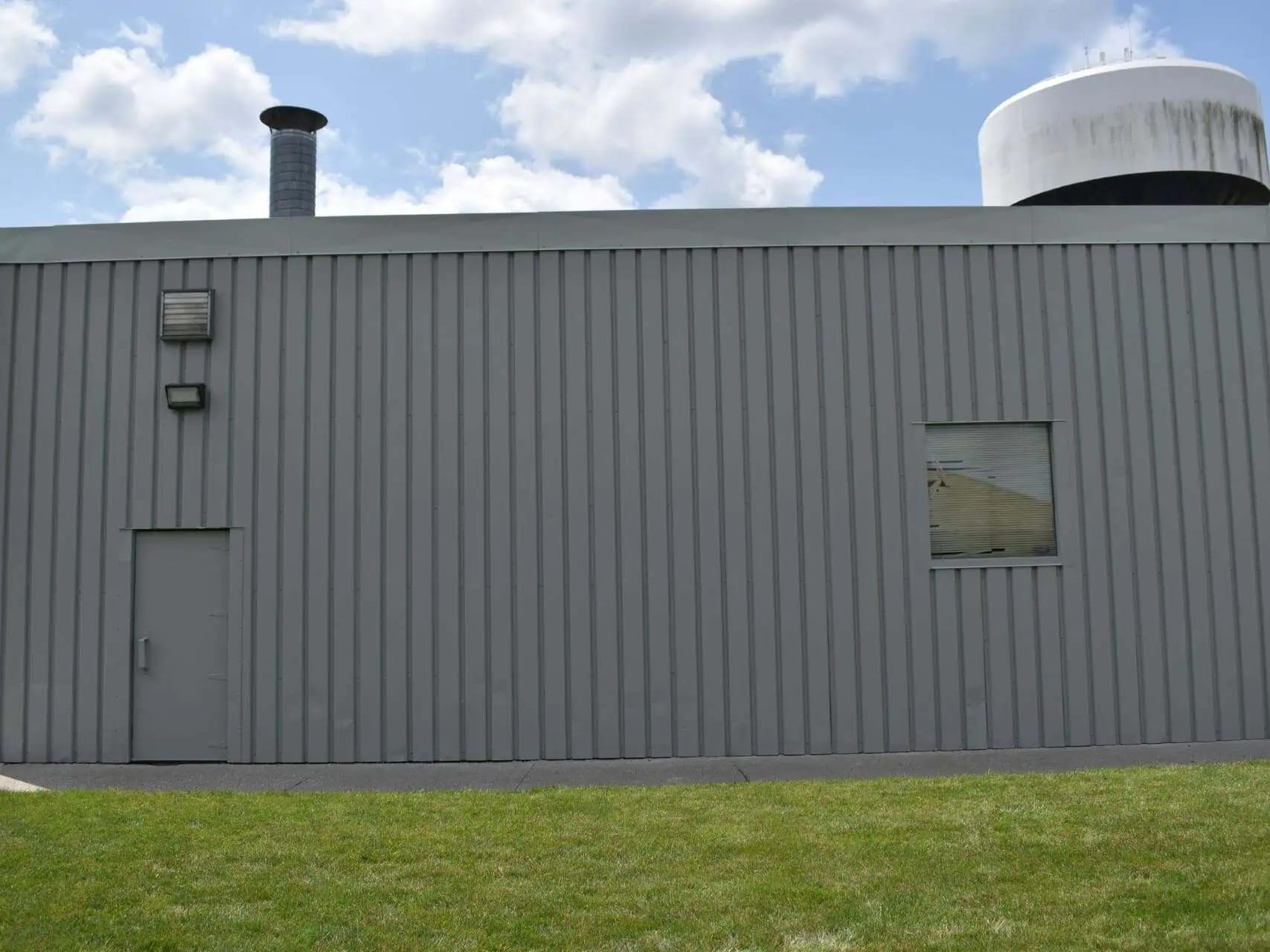 Commercial building exterior with maintained facade and siding