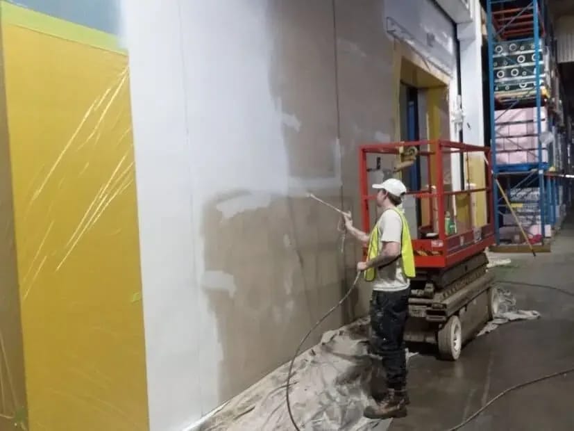 Painting professional preparing or coating commercial surfaces