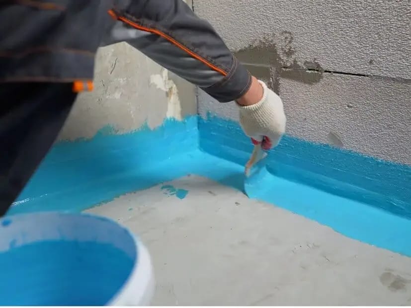 Application of a protective waterproof coating
