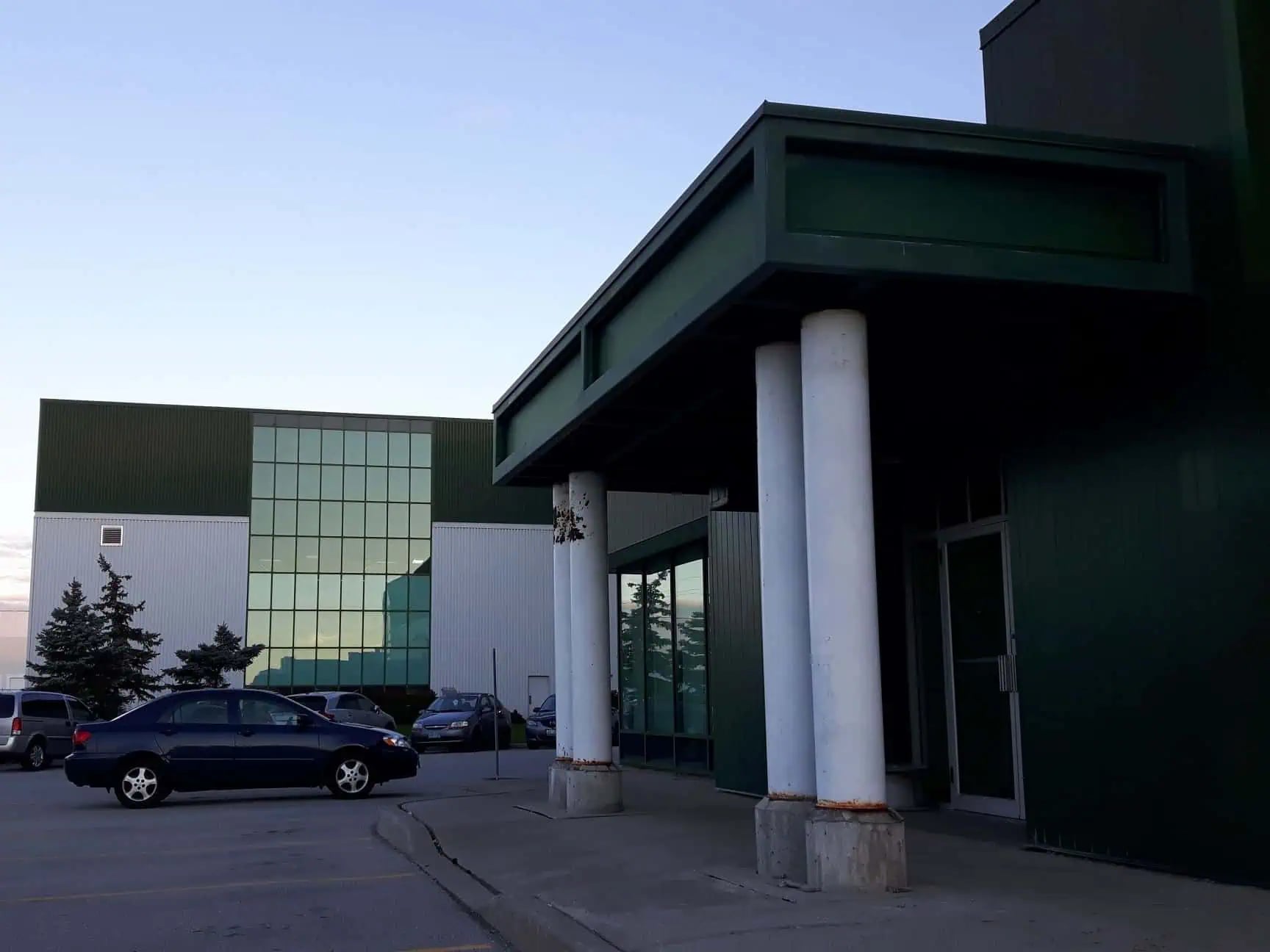 Commercial building exterior with maintained facade and siding